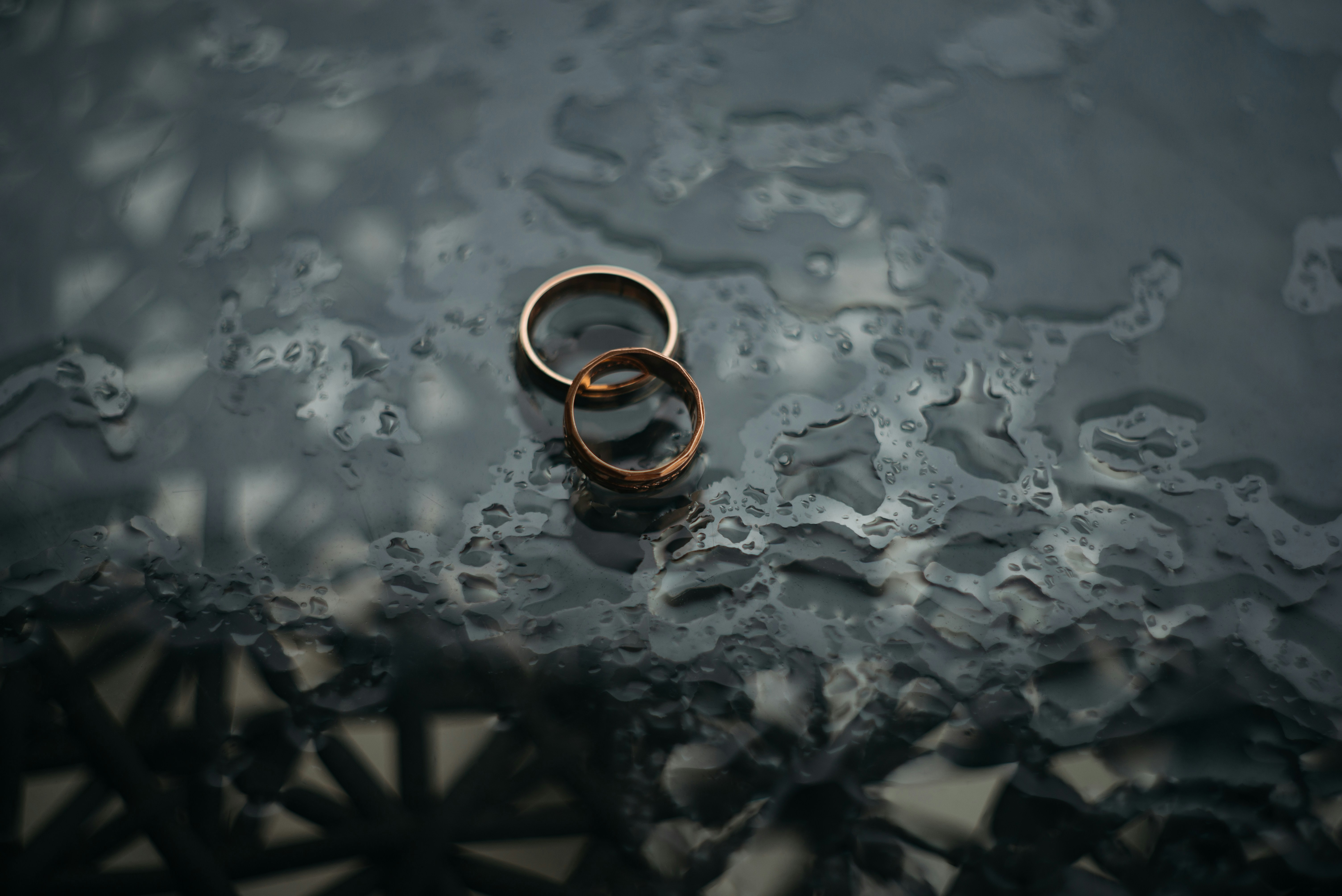 Two Wedding Rings On A Table After Divorce