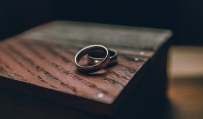 Divorce Without Going To Court Symbolised By Wedding Rings On A Table